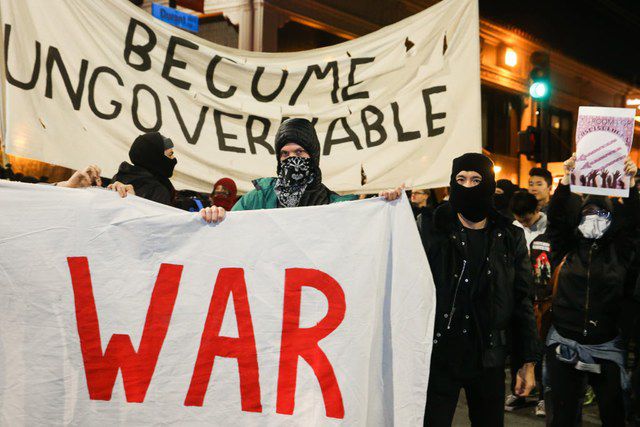 Antifa protesters outside a planned talk by far-right internet troll Milo Yiannoppoulos at the University of California Berkeley, which was canceled amid the violent demonstration.